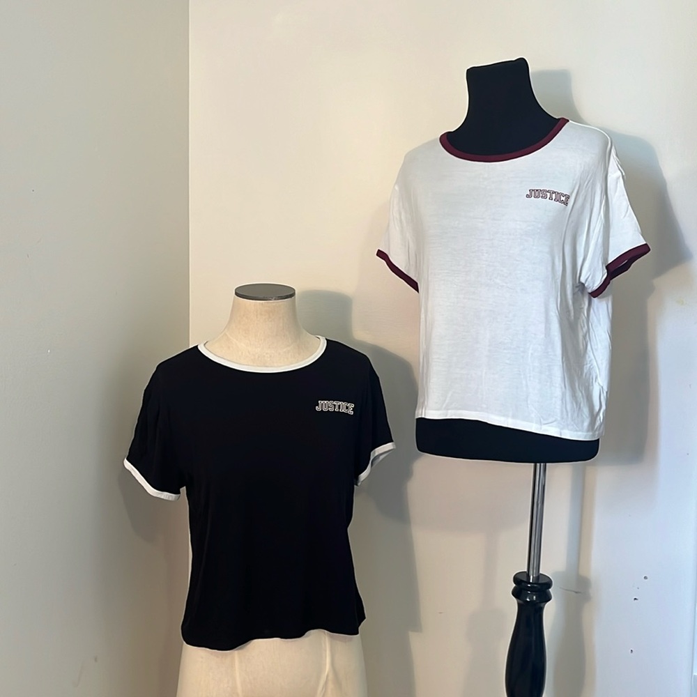 Selling 2 JUSTICE tees. Clothes are black and white